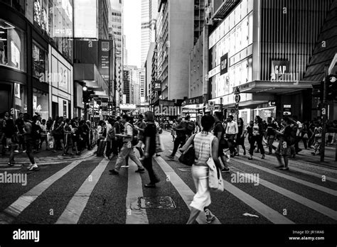 People walking on Queen's Road, Central after work Stock Photo - Alamy