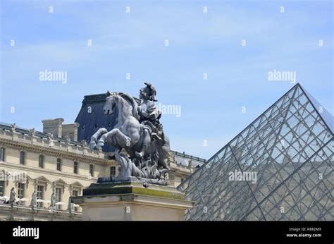 Front Entrance of Louvre with pyramid Stock Photo - Alamy