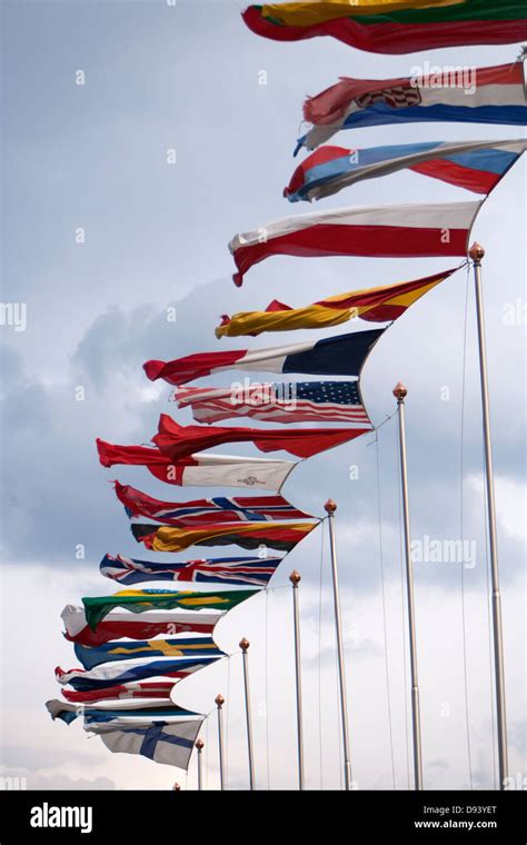 Row of national flags blowing in wind Stock Photo - Alamy