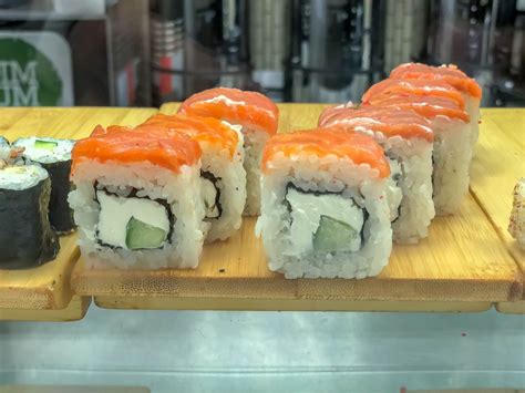 colorful Sushi Set nigiri and sushi rolls for two. Maki, scallop. (Flip ...