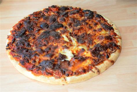 Burned pizza stock image. Image of takeaway, bake, burned - 84649109