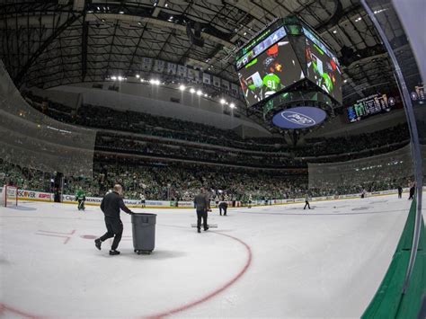 Dallas Stars fans throw debris on to ice, force officials to end period ...