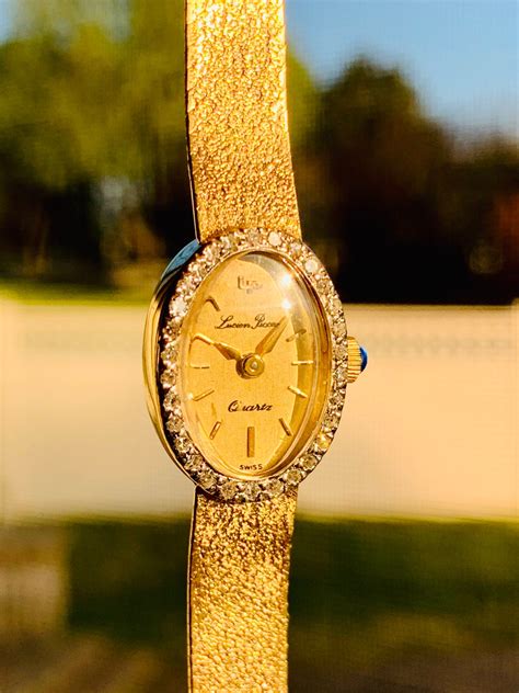 Vintage Ladies Watch Gold Lucien Piccard Gold Watch 14k Gold and diamonds sapphire crown