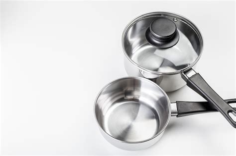 Premium Photo | Stainless steel pots and pans isolated