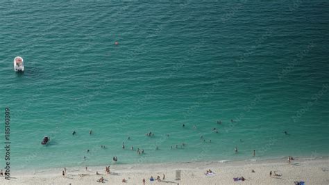 View from the hotel in Dubai at the pool and the beach with the ocean ...