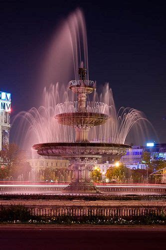 The main fountain in the center of Piata Unirii, Bucharest, Romania ...