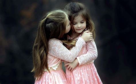 Download Sisters Kissing Pictures | Wallpapers.com