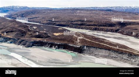 Greenlandic tundra landscape with river from ice cap melting, aerial ...