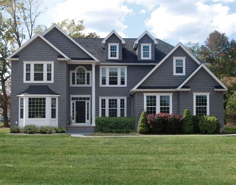 Grey Siding House With Black Windows - ABIEWWS