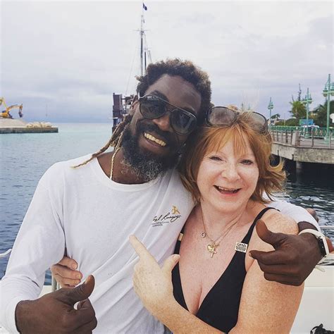 Mum with her favourite Bajan from our trip 5 years ago. She had never been in the sea before ...