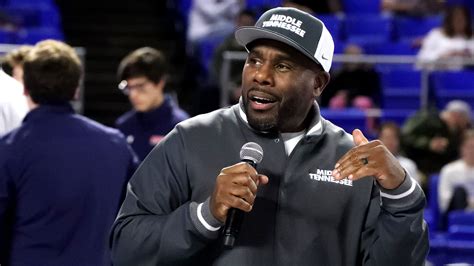 MTSU football coach Derek Mason speaks to Blue Raider basketball fans