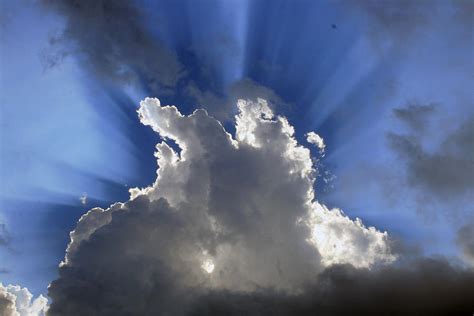 Sunburst Through Clouds Photograph by Robert Hamm - Fine Art America