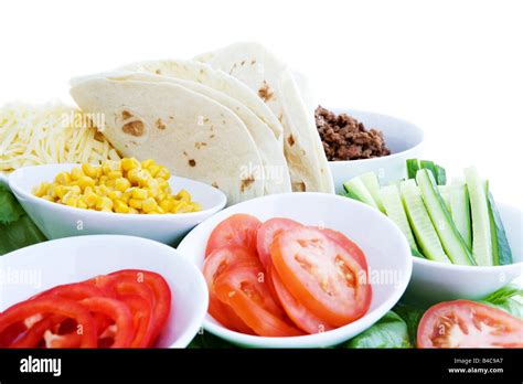 A layout of taco ingredients isolated on white Stock Photo - Alamy