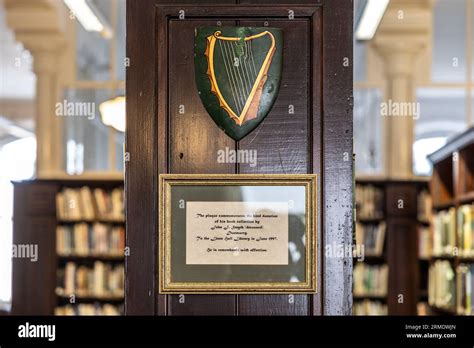 Commemorative plaque to John J. Smyth, Dunmurry, with green harp motif ...