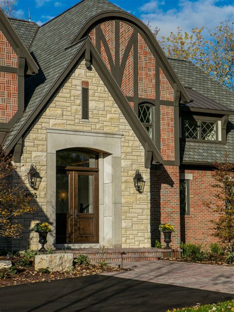 Two-story Exterior Design Ideas, Renovations & Photos with a Clipped Gable Roof