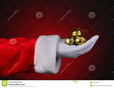 Santa With Handful Of Sleigh Bells Stock Images - Image: 26456854