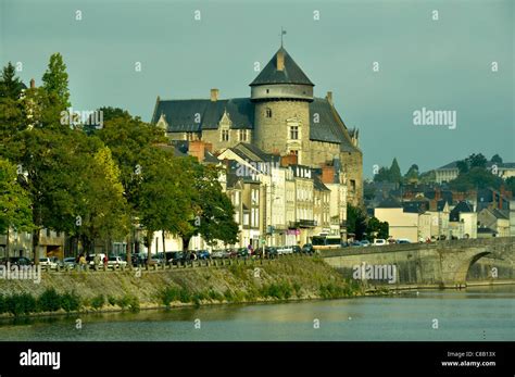 Castle of Laval city in Mayenne (Pays de la Loire, France). The river ...