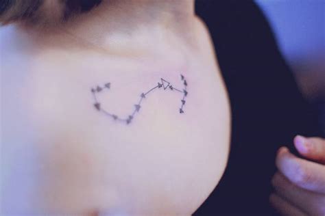 Scorpius constellation tattoo on the collarbone.