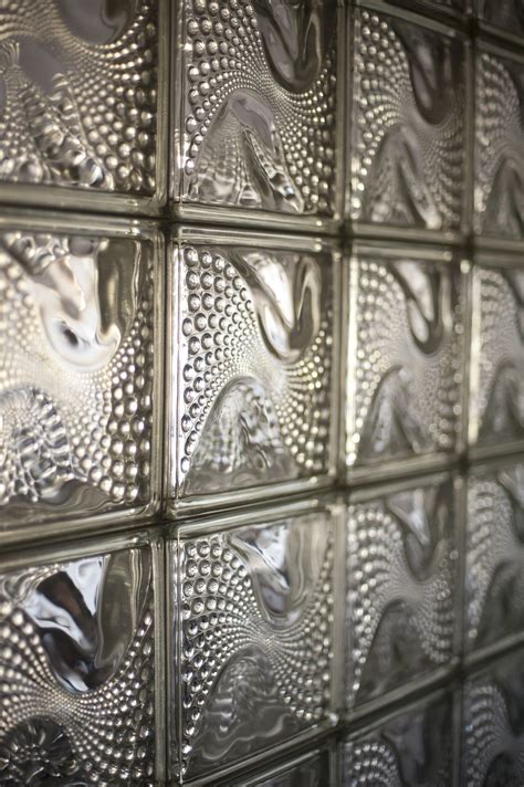 Free Image of Close Up Detail of Swirl Design Glass Block Wall | Freebie.Photography