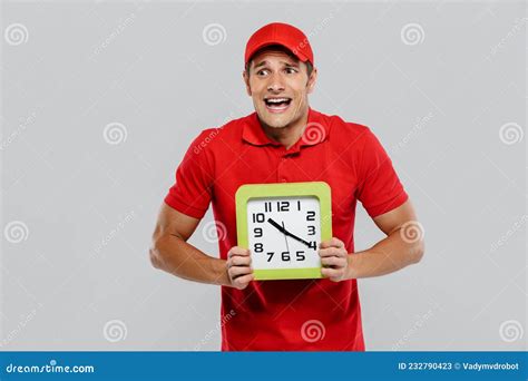 Young Shocked Delivery Man in Uniform Screaming while Showing Clock Stock Image - Image of ...