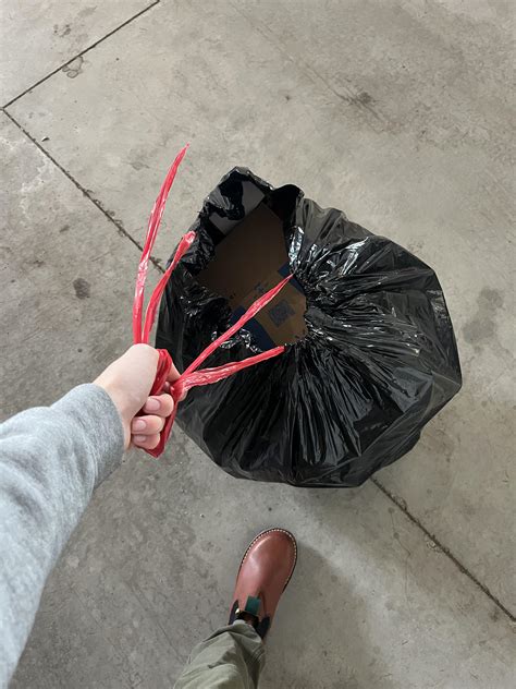 Trash bag handles that cant support the weight of a couple cardboard boxes : r/mildlyinfuriating