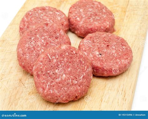 Raw beef burgers stock photo. Image of uncooked, food - 19315496