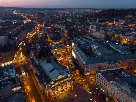 Premium Photo | Aerial view of city in night time streets in car lights