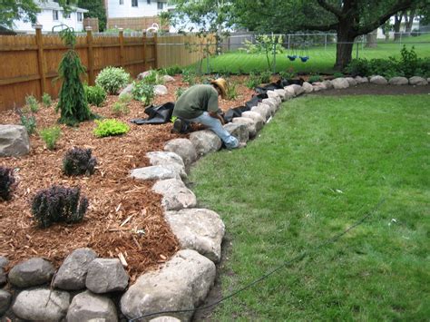 Fieldstone Boulder Wall & Planting Bed - Pahl's Market - Apple Valley, MN