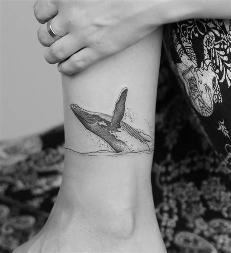 Humpback whale breaching by Minnie at Seventh Day Tattoo Studio. | Sleeve tattoos, Geometric ...