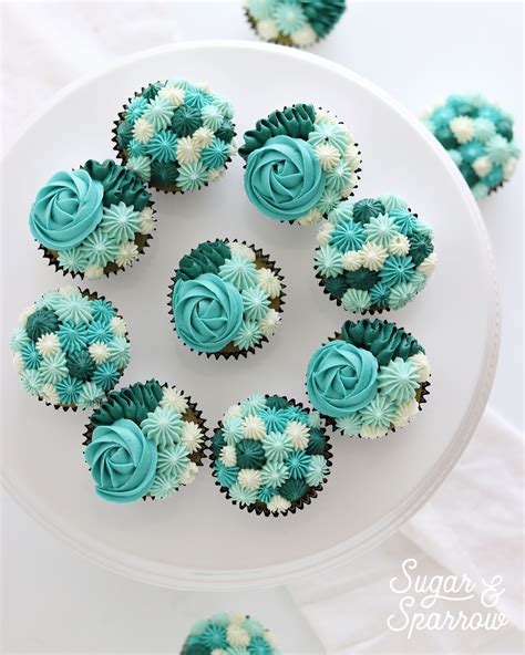 Monochromatic teal birthday cupcakes! Made possible with four different shades of teal and three ...