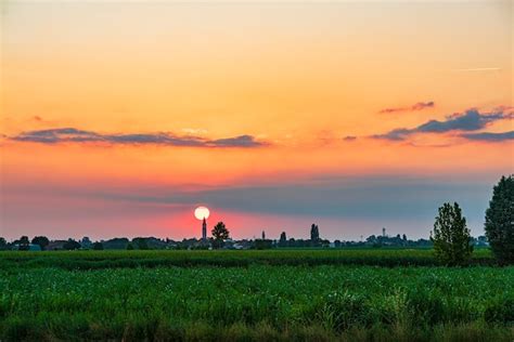 Premium Photo | Landscape of Field sunset country city silhouette