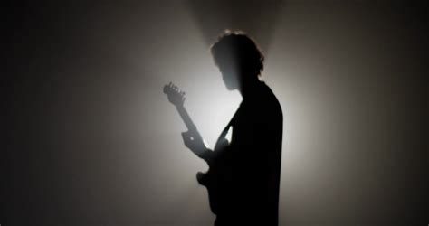 Silhouette Of Rock Musician Playing Guitar Stock Footage SBV-348546113 ...