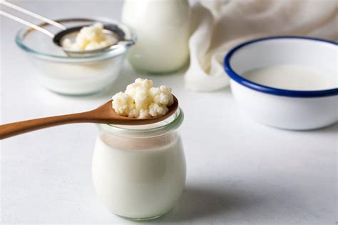 Premium Photo | Kefir fermented milk drink with kefir grains. homemade ...