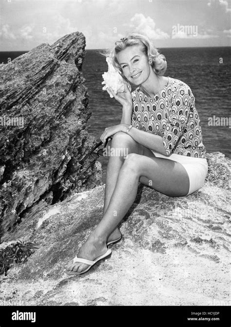 Dina Merrill, vacationing in Bermuda, August 1961 Stock Photo - Alamy