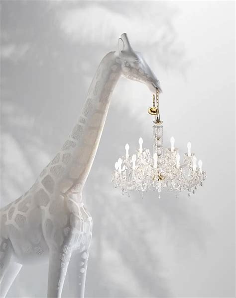 You Can Now Buy Life-Sized Giraffe Lights for Your Home That Hold Chandeliers in Their Mouths ...