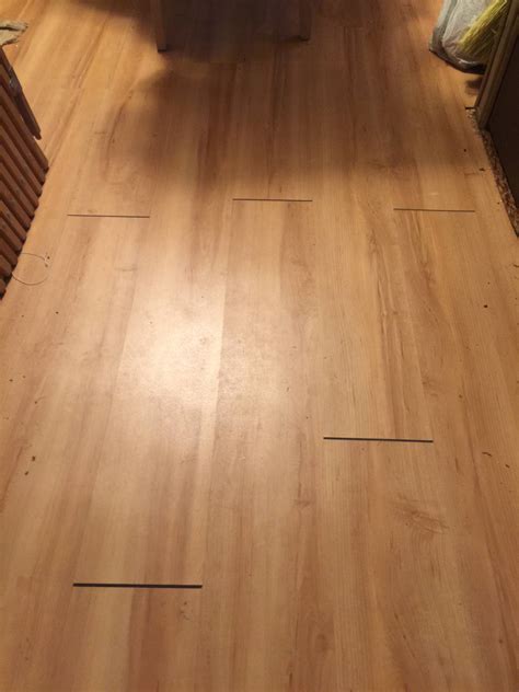 The vinyl plank click flooring I installed in two rooms develops gaps at the ends between the ...