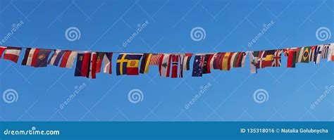 Row of Small Flags of Different Countries on a Rope Stock Photo - Image of hanging, rope: 135318016