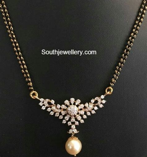 Pin by kunjal on jewlry | Black beads mangalsutra design, Black beaded jewelry, Mangalsutra chain