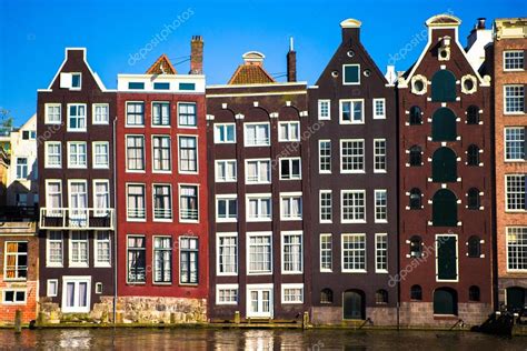 Traditional dutch medieval buildings in Amsterdam Stock Photo by ©d ...