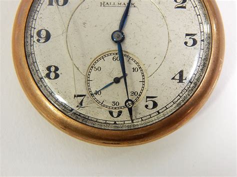 Vintage Hallmark Pocket Watch with Coin Fob and Chain | EBTH