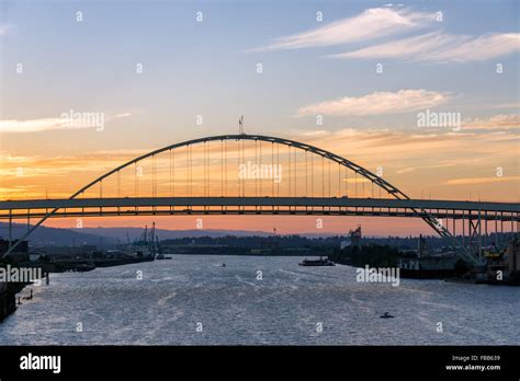 Fremont Bridge in Portland, Oregon at sunset at the end of a beautiful summer day Stock Photo ...