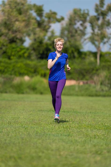 young female runner training for marathon 11928752 Stock Photo at Vecteezy