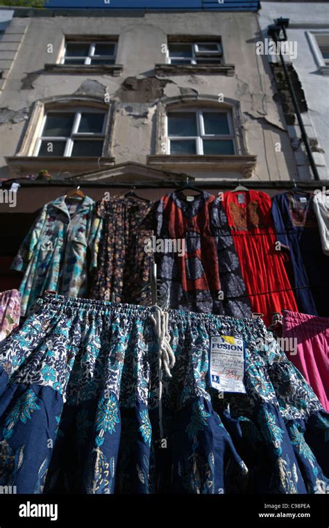 clothes at notting hill market Stock Photo - Alamy