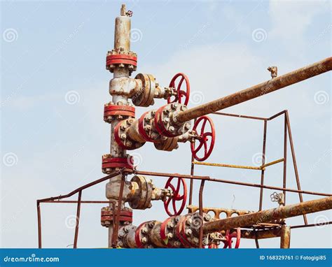 Well for Oil and Gas Production. Oil Well Wellhead . Oil Production Stock Image - Image of ...