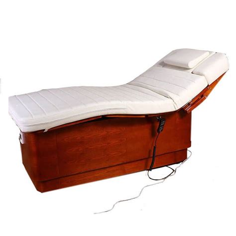 Electric massage bed,Equiped with three motors ,lift freely , A wooden electric massage bed that ...