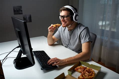 Man In Headset Playing Computer Video Game At Home Stock Photo - Image of entertainment, person ...