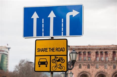 Premium Photo | Yellow metal bicycle and car sign