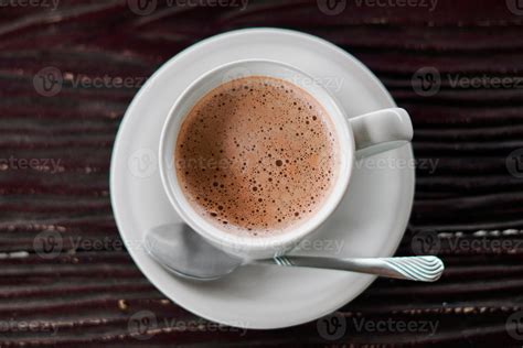 aesthetic a cup of coffee on wooden background 8140375 Stock Photo at Vecteezy