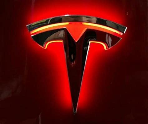 Tesla Logo on Red Background