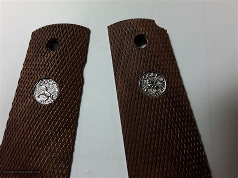 COLT 1911 ORIGINAL WOOD GRIPS W/SILVER INSIGNIA NOS